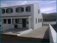 Vista Traseira - Estacionamento e Churrasco